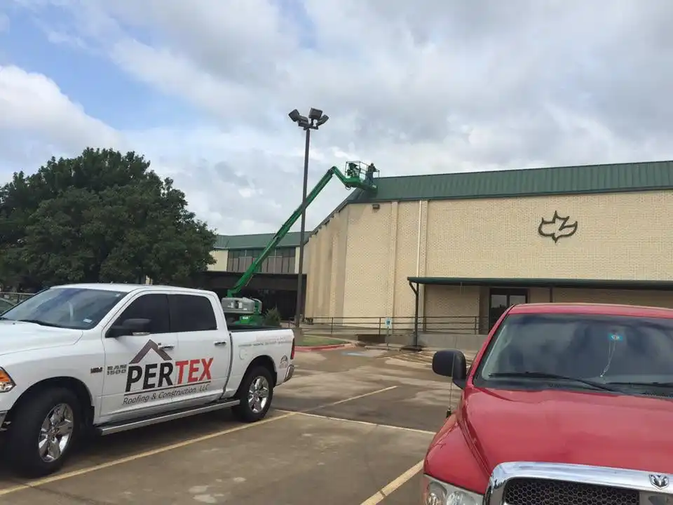 PERTEX truck and boom lift at church roof restoration Plano Texas